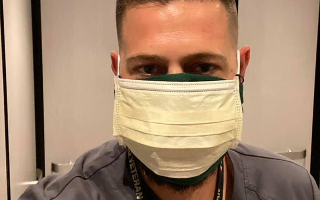 Dustin Baker wearing a PPE mask